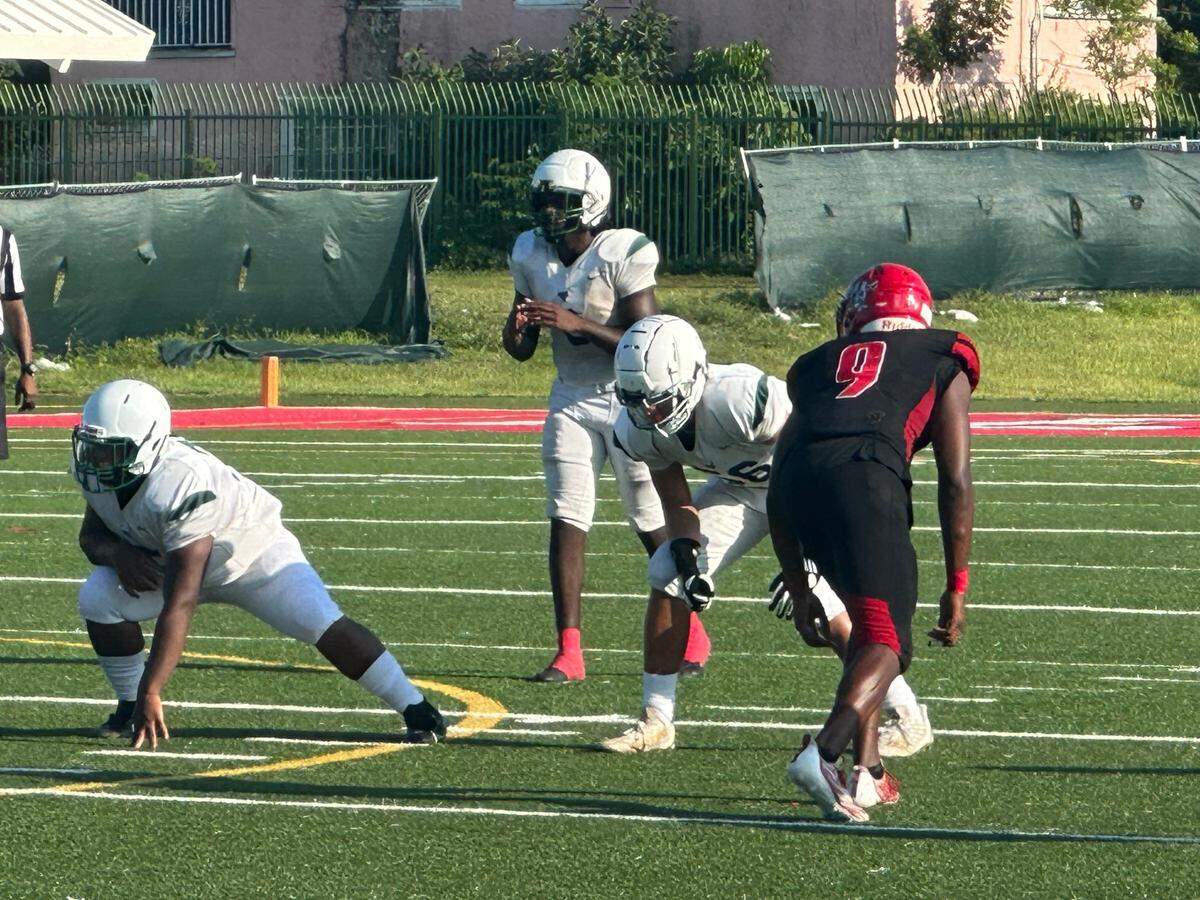 North Miami quarterback Michael Zephirin waits for the snap during Thursday afternoon’s game against Miami Edison at Edison High.