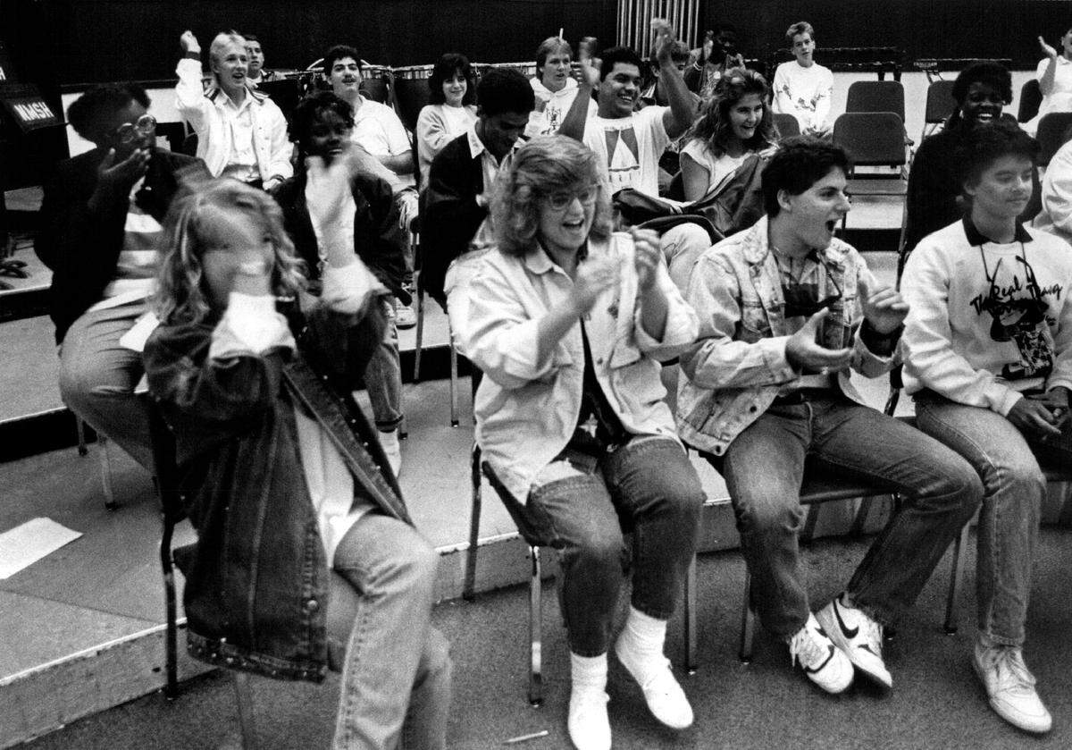 Band members at North Miami Senior High School celebrate after hearing that they made Orange Bowl.