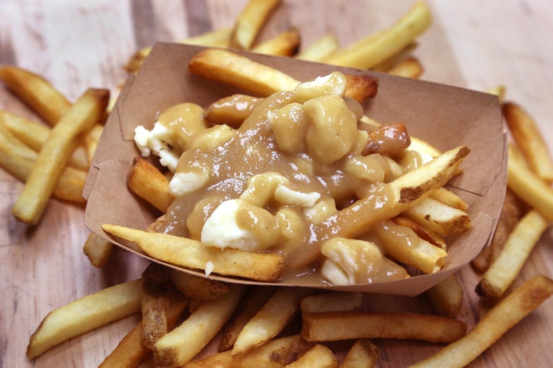Poutine is a French Canadian dish that is sold once a week at the husband-and-wife butcher shop named Babe’s Meat & Counter in Pinecrest.
