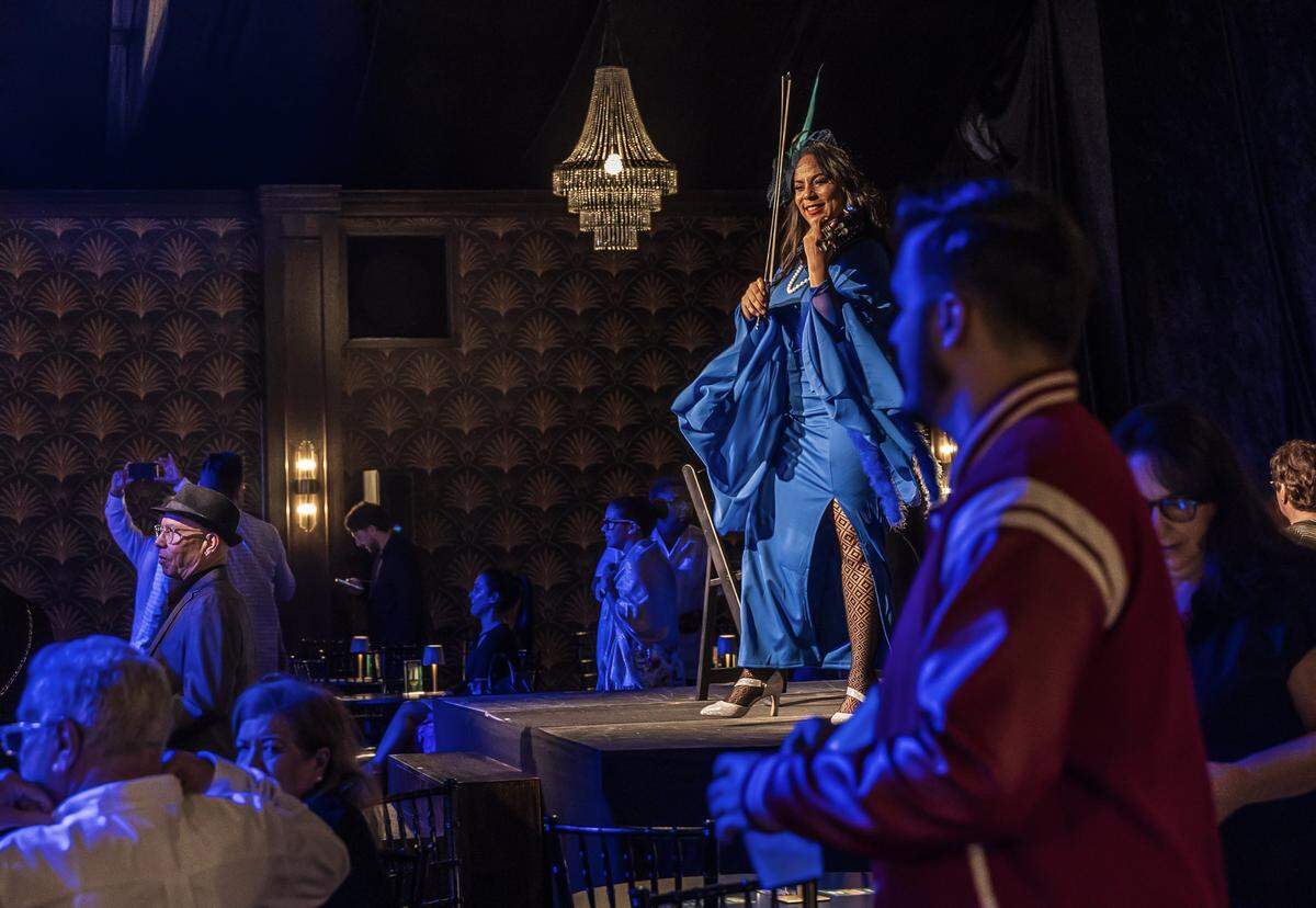 Violinist Muriel Reinoso Lezcano performs at the cabaret ahead of the “Muerto de Risa – El Último Show de Álvarez Guedes,” an immersive comedy cabaret honoring the Godfather of Latin Comedy. 