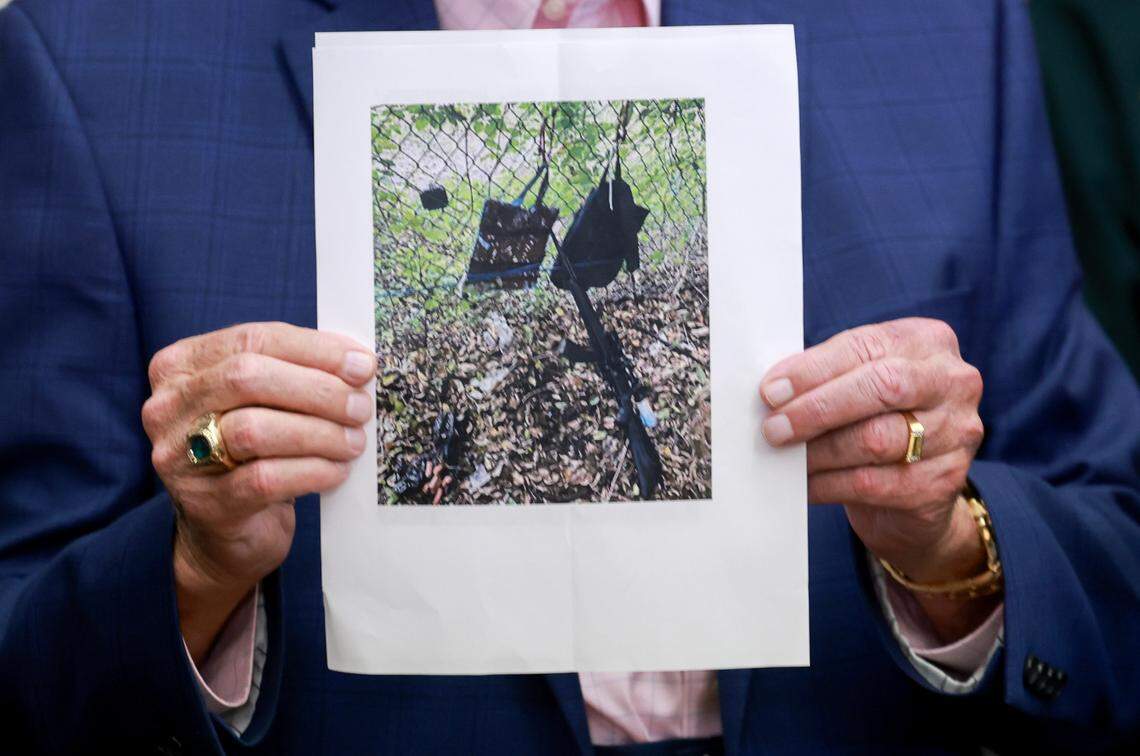 WEST PALM BEACH, FLORIDA - SEPTEMBER 15: Palm Beach County Sheriff Ric Bradshaw holds a photograph of the rifle and other items found near where a suspect was discovered during a press conference regarding an apparent assassination attempt of former President Donald Trump on September 15, 2024 in West Palm Beach, Florida. The FBI and U.S. Secret Service, along with the Palm Beach County Sheriff’s office, are investigating the incident, which the FBI said “appears to be an attempted assassination of former President Trump’ while he was golfing at Trump International Golf Club. (Photo by Joe Raedle/Getty Images)