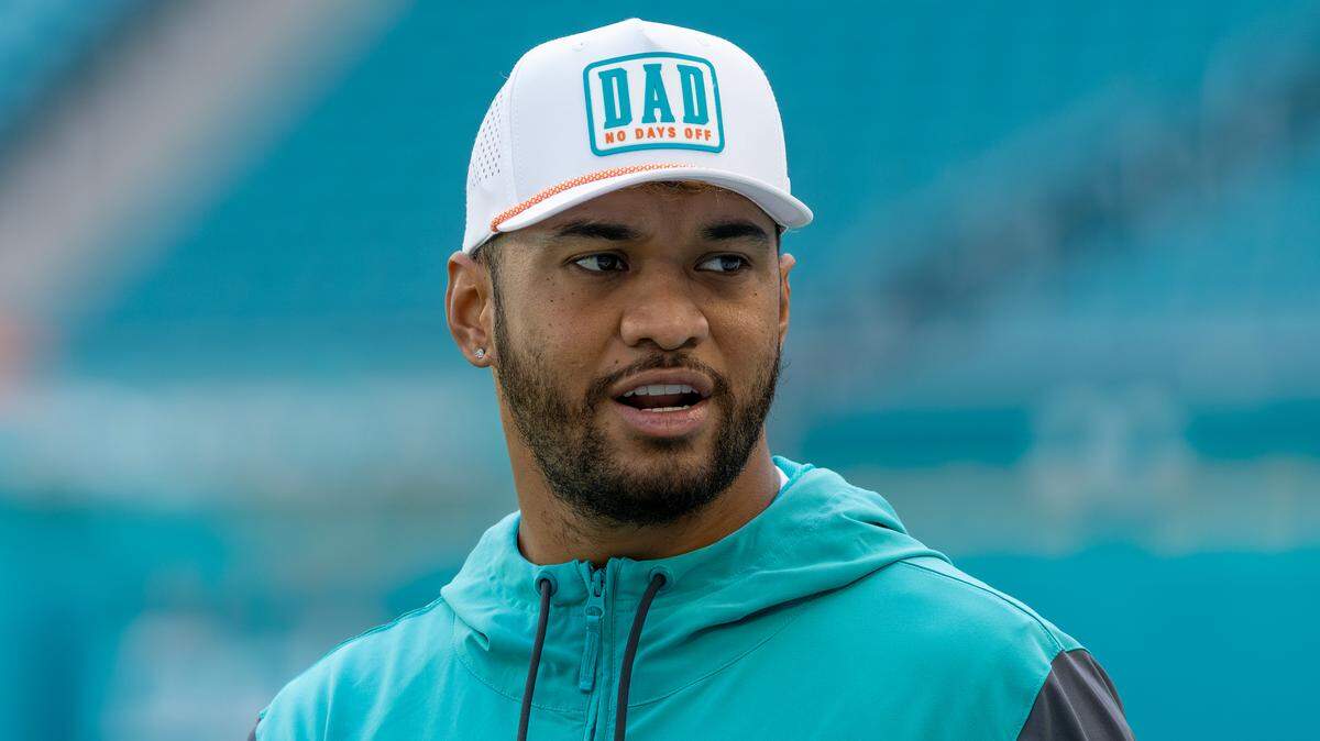 Miami Dolphins quarterback Tua Tagovailoa (1) looks on before the start of their NFL game against the New York Jets at Hard Rock Stadium on Sunday, Dec. 8, 2024, in Miami Gardens, Fla
