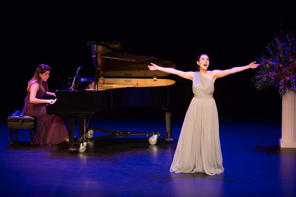 Pianist Maria Paulina Garcia accompanies singer Sandra Hamaoui in the 2017 YPO Voice Competition at the Colony Theater Miami Beach.