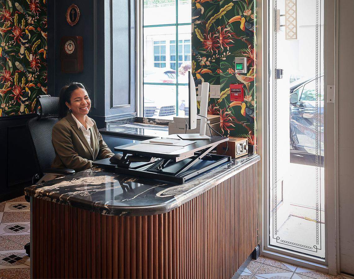 Casa Cañita's, the new boutique hotel on historic Ocean Drive in Miami Beach, front desk receptionist greets visitors with a smile as it prepares to open under the direction of designer Nicolette Bernstein, her sister, chef Michelle Bernstein, and partners. The hotel was toured ahead of its grand opening on Tuesday, April 21, 2026.