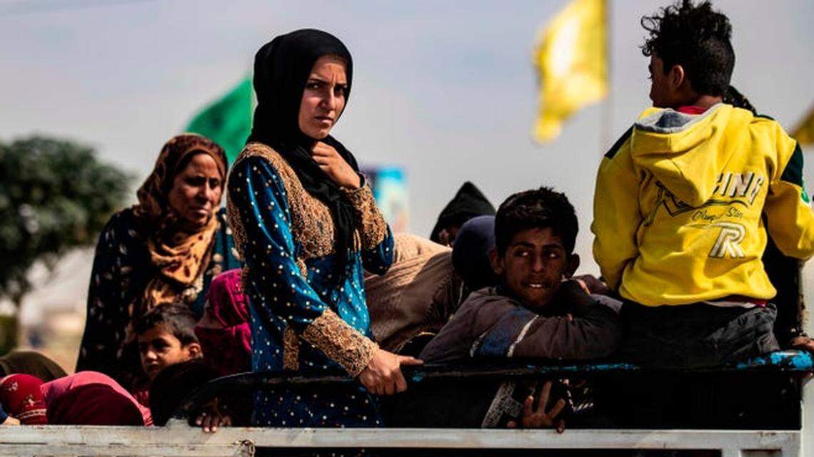 Kurdish and Arab civilians flee northeastern Syria in the midst of Turkey’s attacks on the Kurd-controlled area.