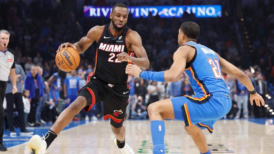 Miami Heat forward Andrew Wiggins (22) drives down the court against Oklahoma City Thunder guard Aaron Wiggins (21) during the first quarter at Paycom Center.