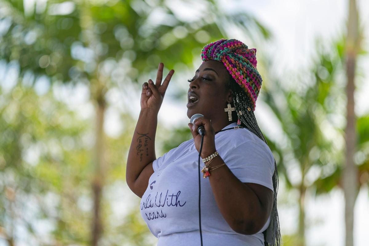 Candii Reid, founder of Girls With Scars Inc., speaks during the fourth annual Women’s March and Rally at the Betty T. Ferguson Recreational Complex in Miami Gardens on Saturday, January 18, 2020.
