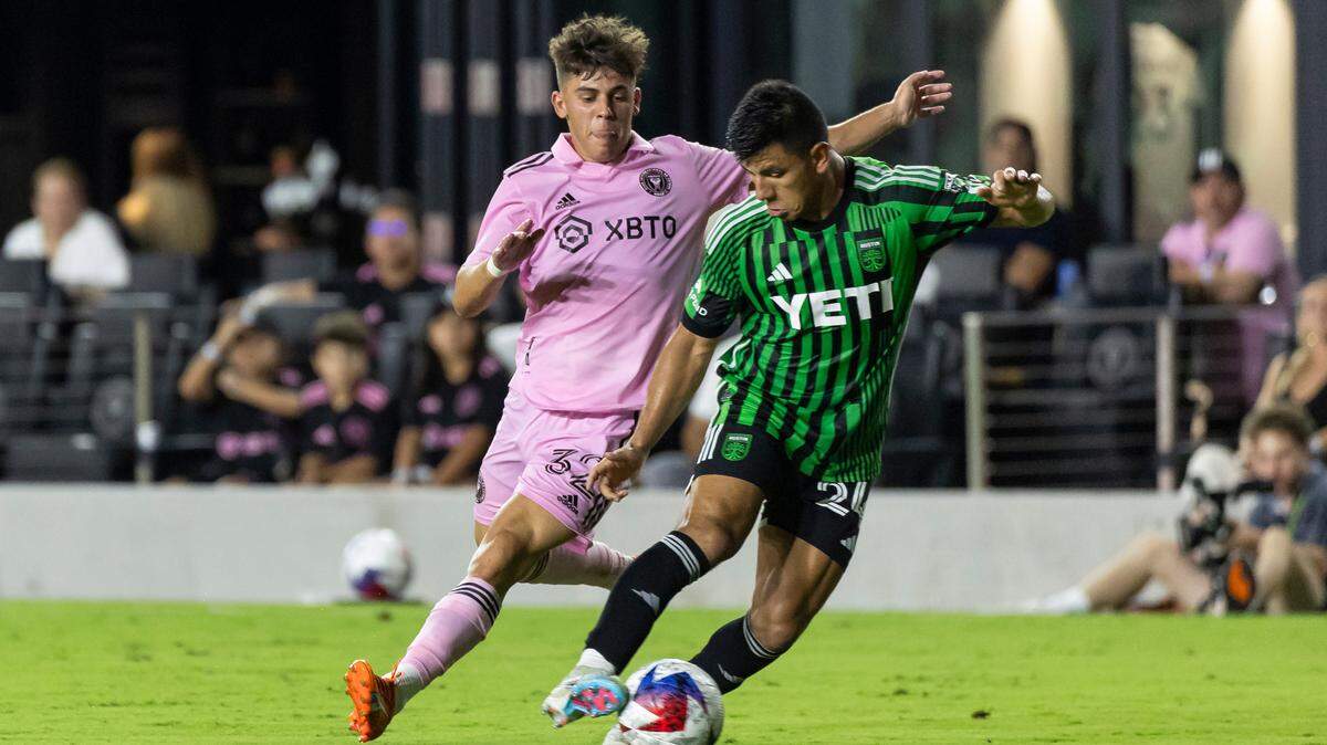 Inter Miami defender Noah Allen (32) and Austin FC defender Nick Lima (24) compete for the ball in the second half of their MLS match at DRV PNK Stadium on Saturday, July 1, 2023, in Fort Lauderdale, Fla.