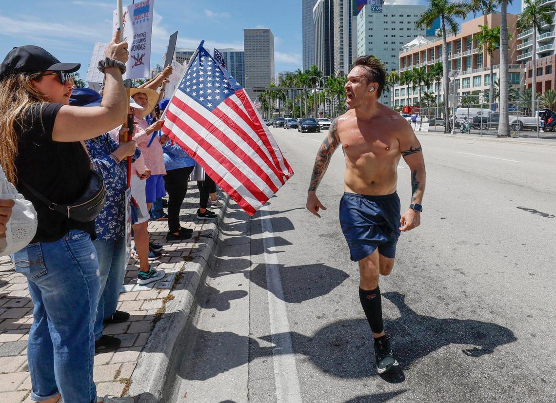 A counter protester holler at protesters during a ‘No Kings’ anti-Trump protest at the Torch of Friendship monument at Bayfront Park in Miami, Florida on Saturday, June 14, 2025