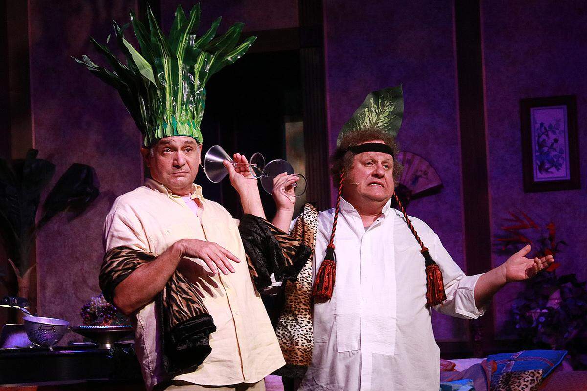 Nick Santa Maria and Ken Clement do their best Pocahontas and Minnehaha impressions in the Actors’ Playhouse production of ‘The Big Bang.’