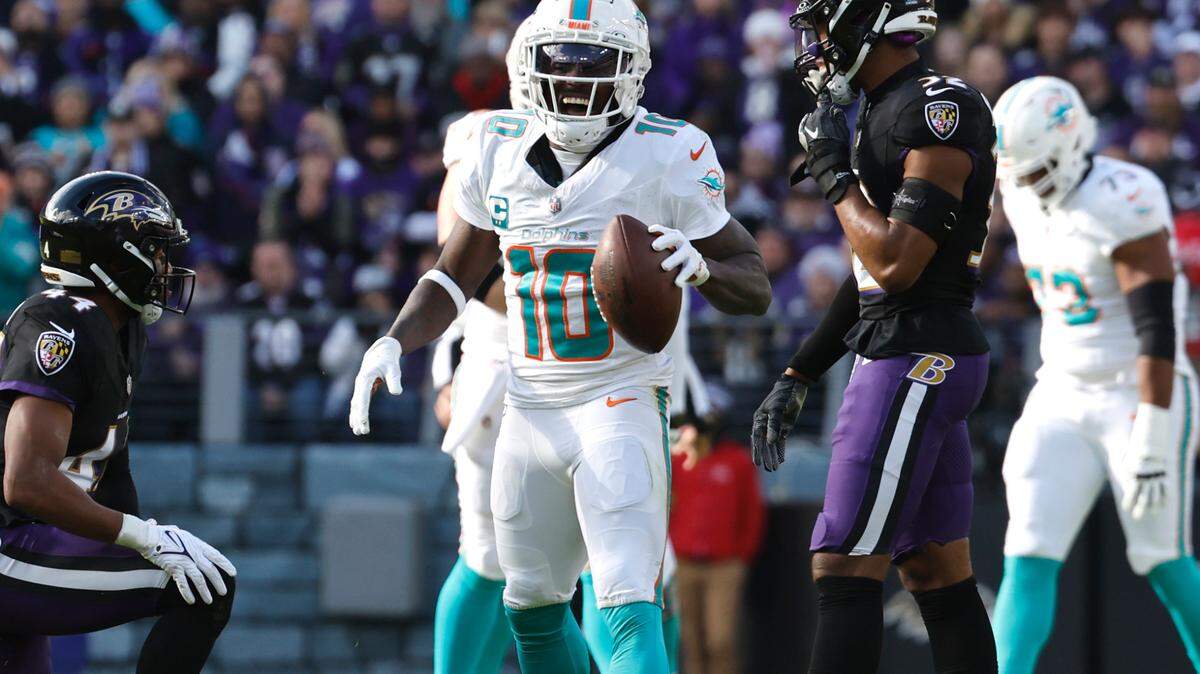Miami Dolphins wide receiver Tyreek Hill (10) reacts after a play during first half of an NFL football game against the Baltimore Ravens at M&T Bank Stadium in Baltimore, Maryland on Sunday, December 31, 2023.
