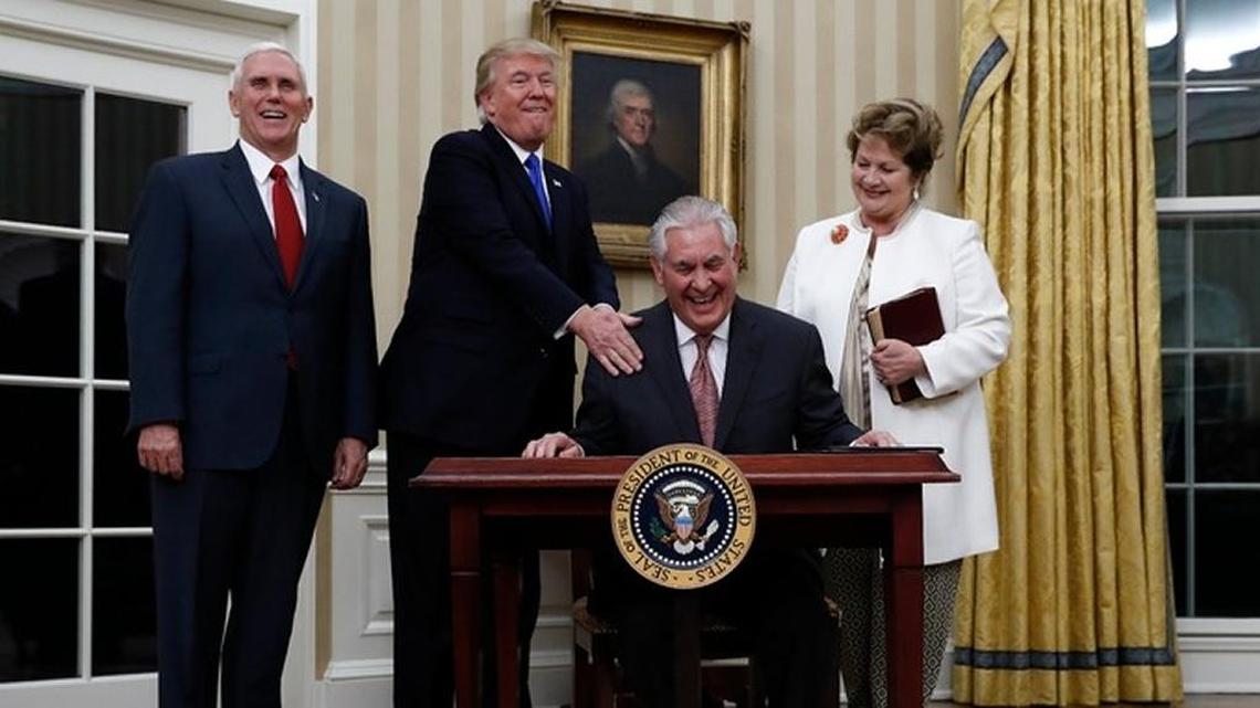 Vice President Mike Pence and President Donald Trump at Secretary of State Rex Tillerson’s swearing in day back in February. Tillerson’s wife, Renda, watches the hijinks.