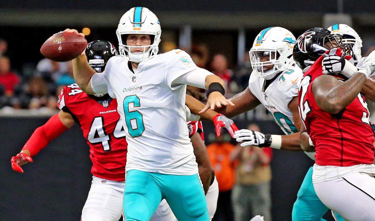 Miami Dolphins quarterback Jay Cutler (6) throws an interception late in the second quarter as they play the Atlanta Falcons at the Mercedes-Benz Stadium in Atlanta, Georgia, October 15, 2017.