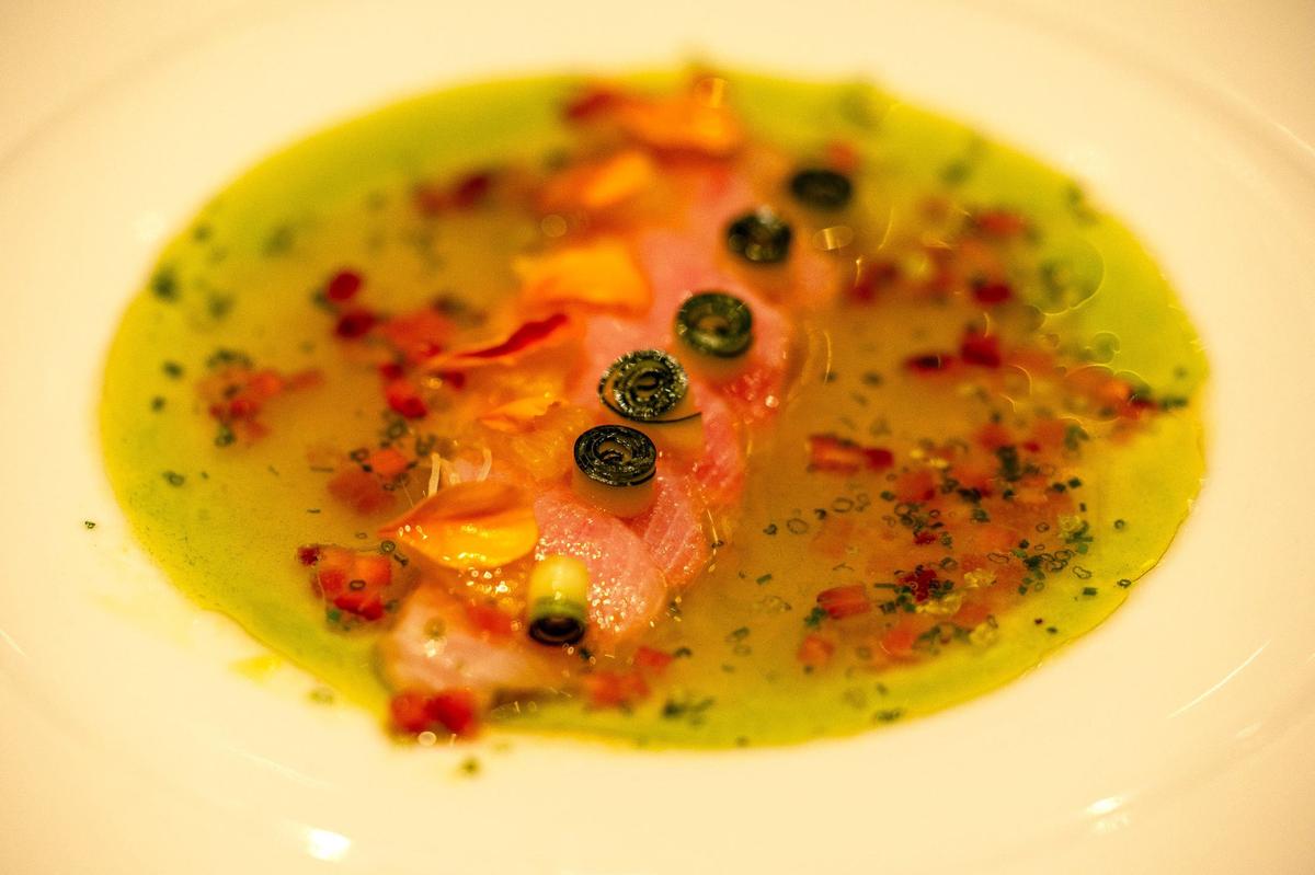 Hamachi crudo with strawberries, pickled mustard seeds and pink peppercorn honey vinegar by Chef Danny Ganem, from the menu at Fiola.