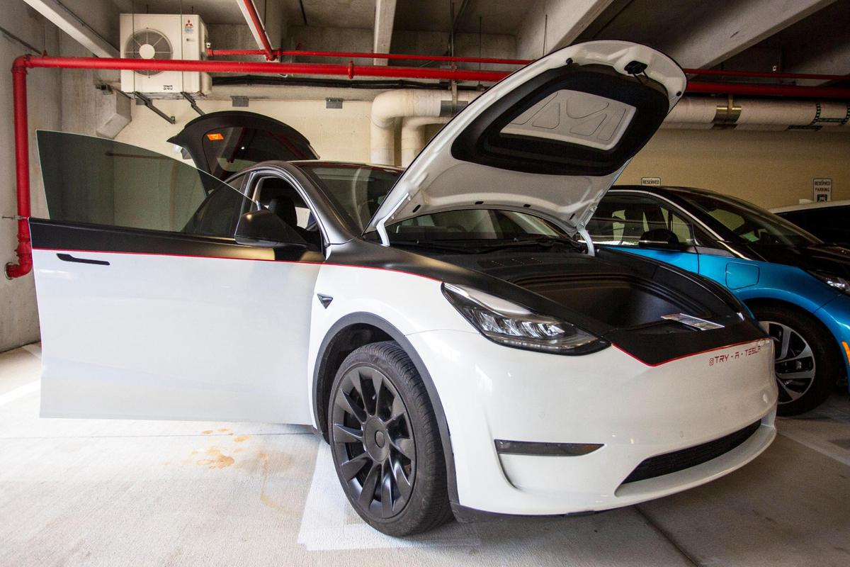 A Tesla SUV its parked by the new charging stations for electric vehicles on Miami-Dade County property at the county’s West Lot Garage on 220 NW 3rd Street, as part of its transition to low carbon transportation to combat climate change in Miami, Florida, Thursday, September 30, 2021