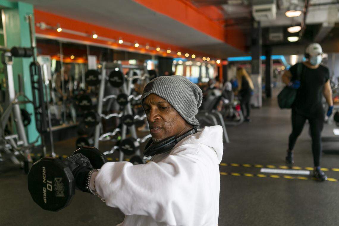 Mykel Tulloch, 57, exercises at a Crunch Fitness in Miami Beach, Florida on Monday, June 8, 2020. Miami-Dade officials lifted a ban that prevented gyms from operating because of the coronavirus pandemic.