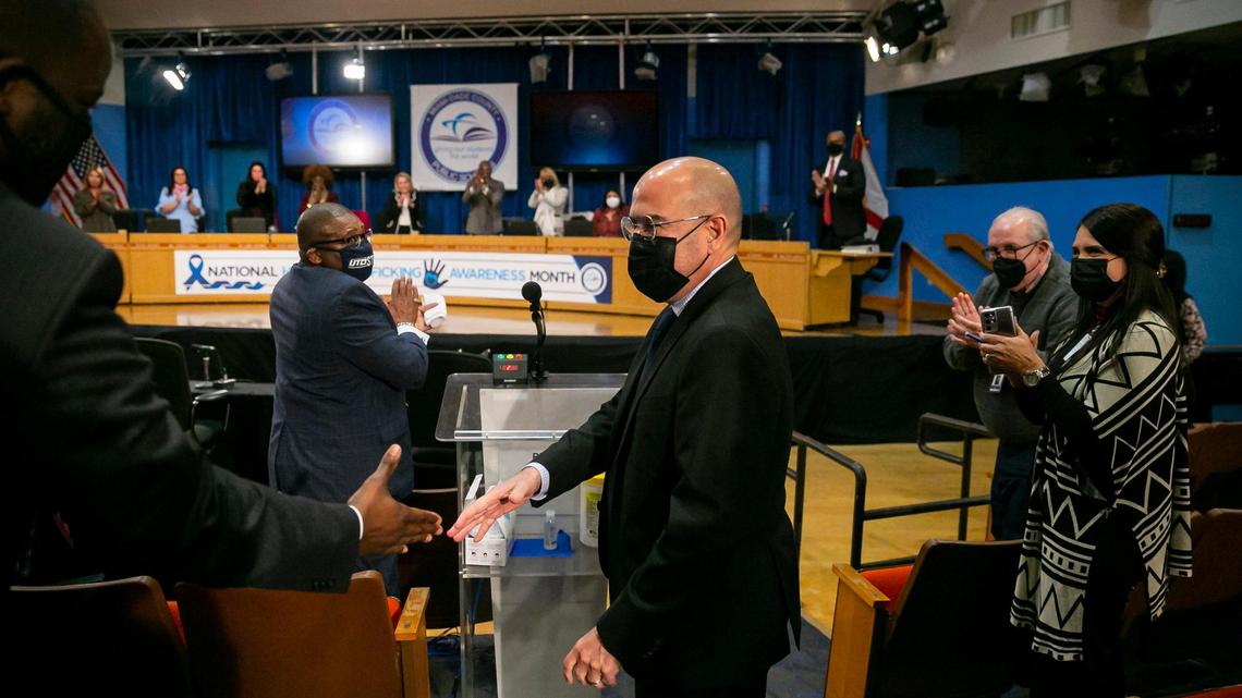 Jose Dotres is congratulated after being selected by the Miami-Dade Public School Board as the next superintendent in a 6-3 vote on Jan. 24, 2022. Dotres, who was deputy superintendent of Collier County Public Schools, was one of three finalists applying for the position of superintendent.