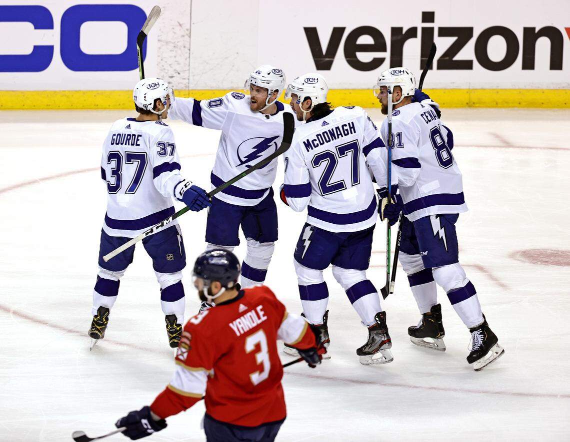 Florida Panthers defenseman Keith Yandle (3) skates as Tampa Bay Lightning center Blake Coleman (20) is congratulated by teammates after scoring during the first period of game 1 of their first round NHL Stanley Cup series at the BB&T Center on Sunday, May 16, 2021 in Sunrise, Fl.