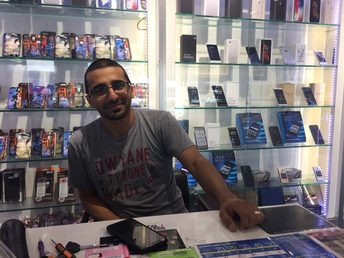 Aiman Jamhour, owner of the Amigo Wireless phone store on the 700 block of Washington Avenue, says business is good but is concerned he could get priced out of the neighborhood in five or seven years.