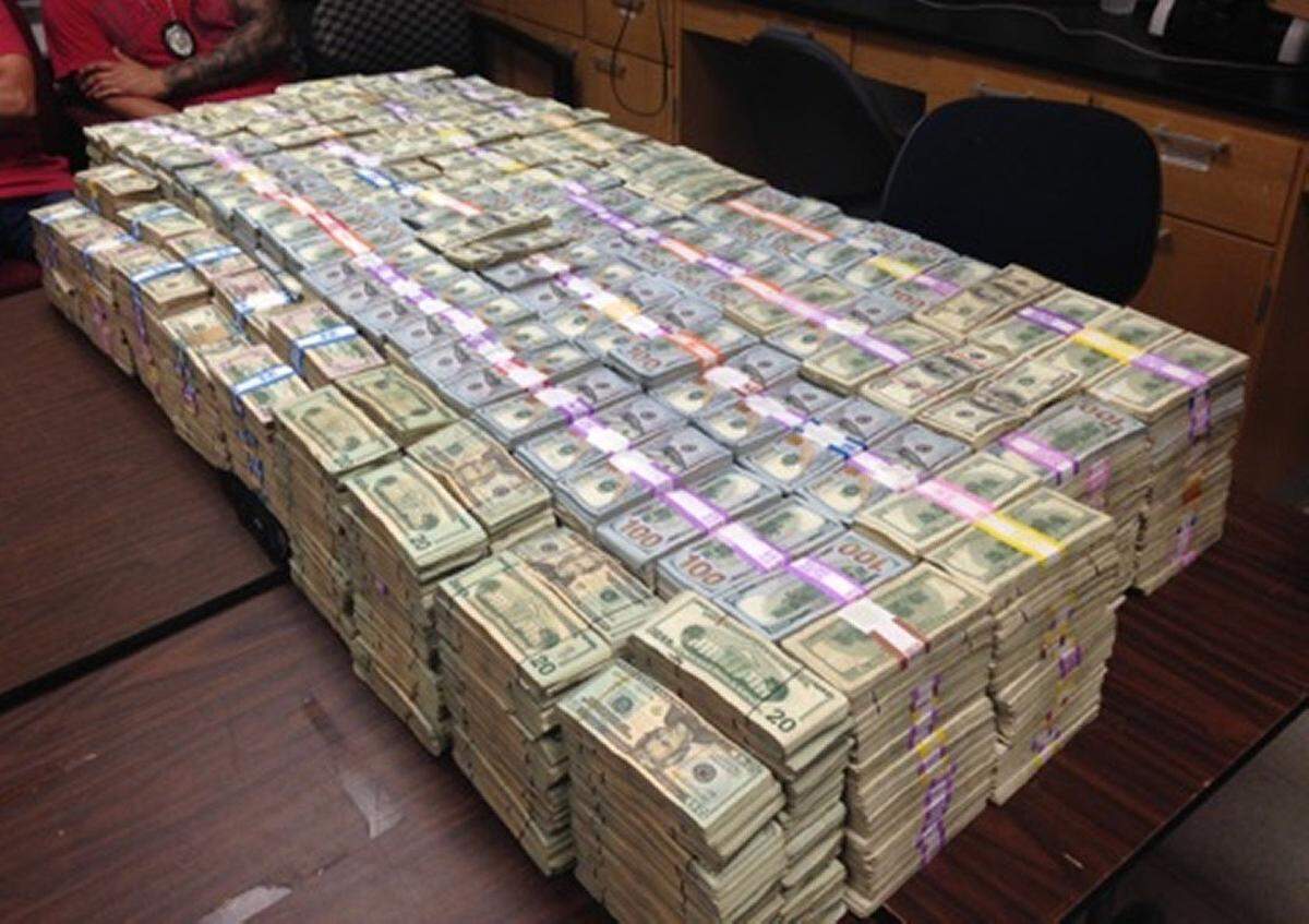 Buckets filled with $22 million found inside the Miami Lakes home of Luis Hernandez-Gonzalez in June.