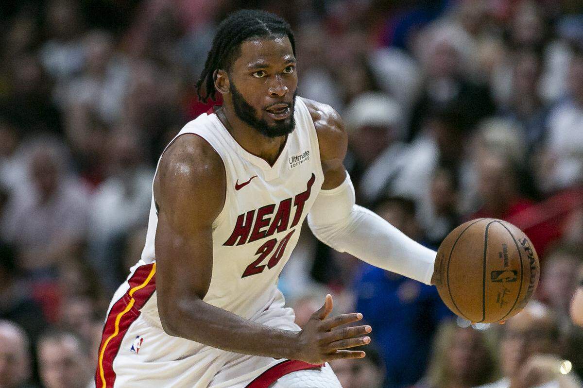 Miami Heat forward Justise Winslow (20) drives the ball down the court against Toronto Raptors during the second quarter of an NBA basketball game at the AmericanAirlines Arena on March 10, 2019.