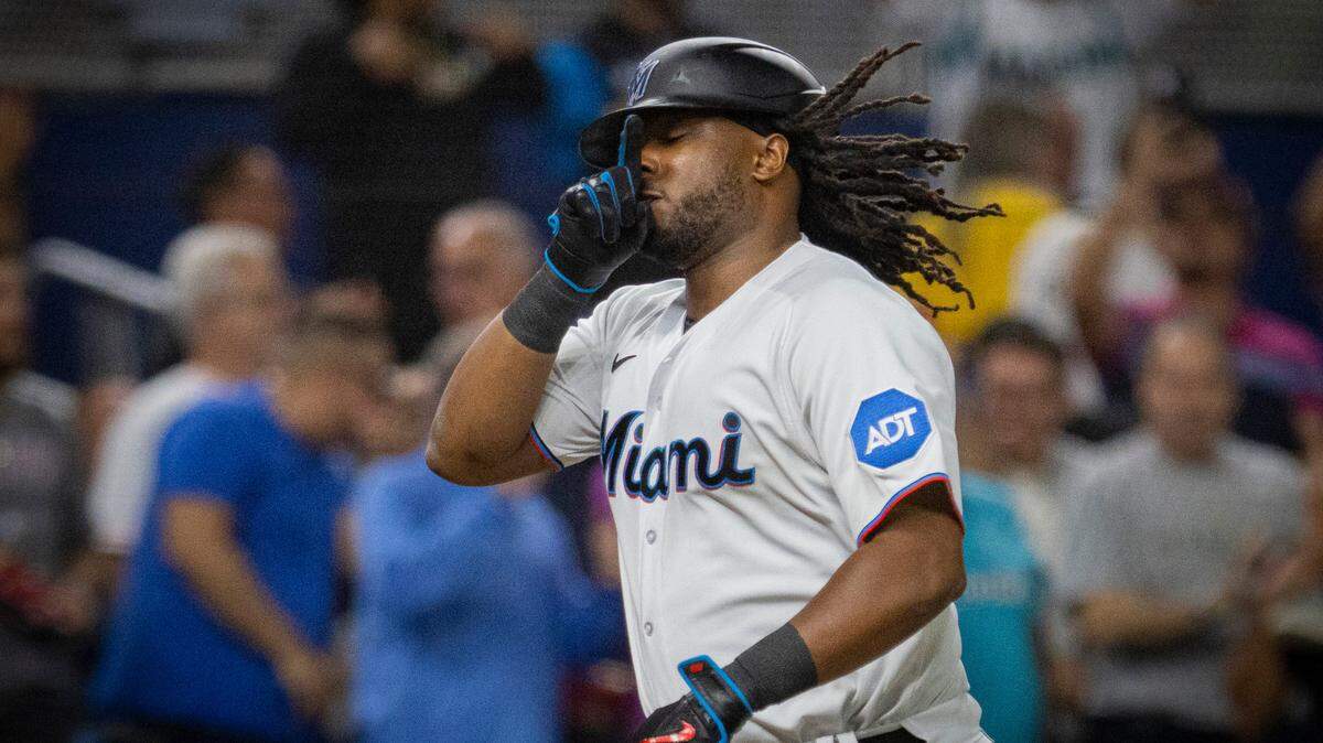 Miami Marlins first baseman Josh Bell (9) comes in to home plate after hitting a home run during the sixth inning of a baseball game on Wednesday, Sept. 20, 2023, at loanDepot Park in Miami, Fla.