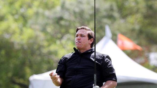 Florida Gov. Ron DeSantis prepares to drive the 1st fairway on March 18, 2019, while participating in the Veterans Alternative Celebrity Pro-Am at the Valspar Championship at the Innisbrook Golf Resort in Palm Harbor.