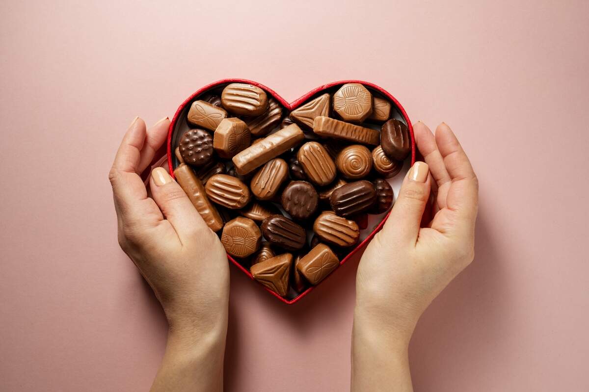 varied chocolate in heart-shaped box