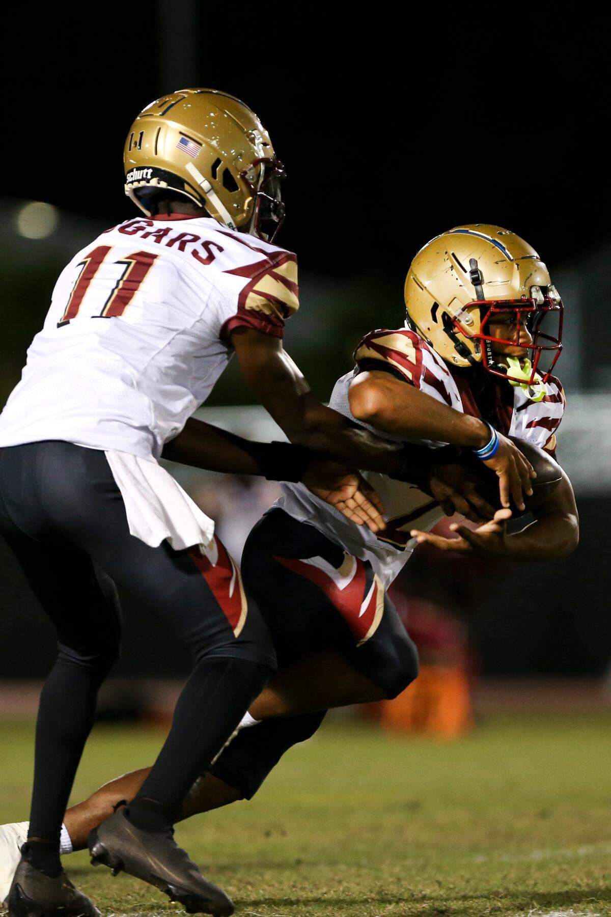 Coconut Creek running back Jamarie Hostzclaw, seen here running the ball against Palmetto in 2022, ran for 114 yards on Friday to lead the Cougars to a 20-15 win over Davie Western.