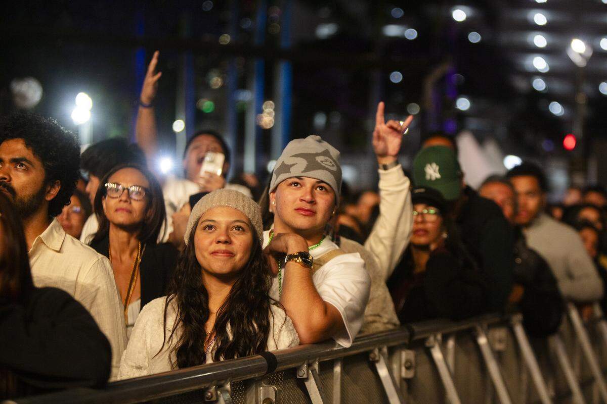 People watch a performance during New Year’s Eve celebrations at Bayfront Park. 