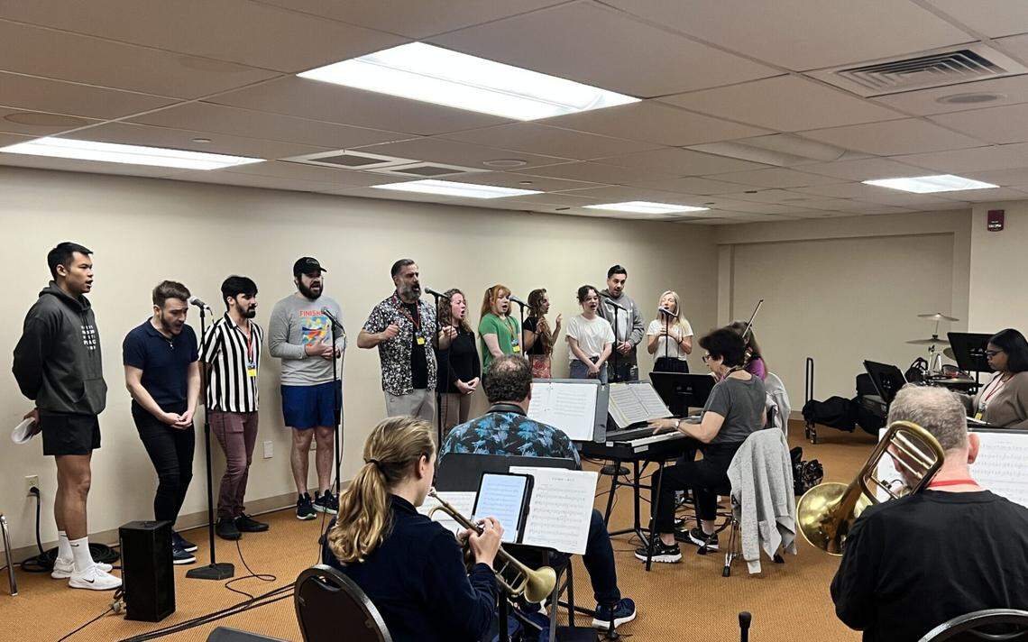 The cast of Zoetic Stage’s “Fiddler on the Roof” rehearses, from left, Nate Promkul, Kalen Edean, Jonathan Eisele, David B. Friedman, Ben Sandomir, Sara Grant, Shayna Gilberg, Caila Katz, Emma Friedman, Henry Gainza, and Jeni Hacker.