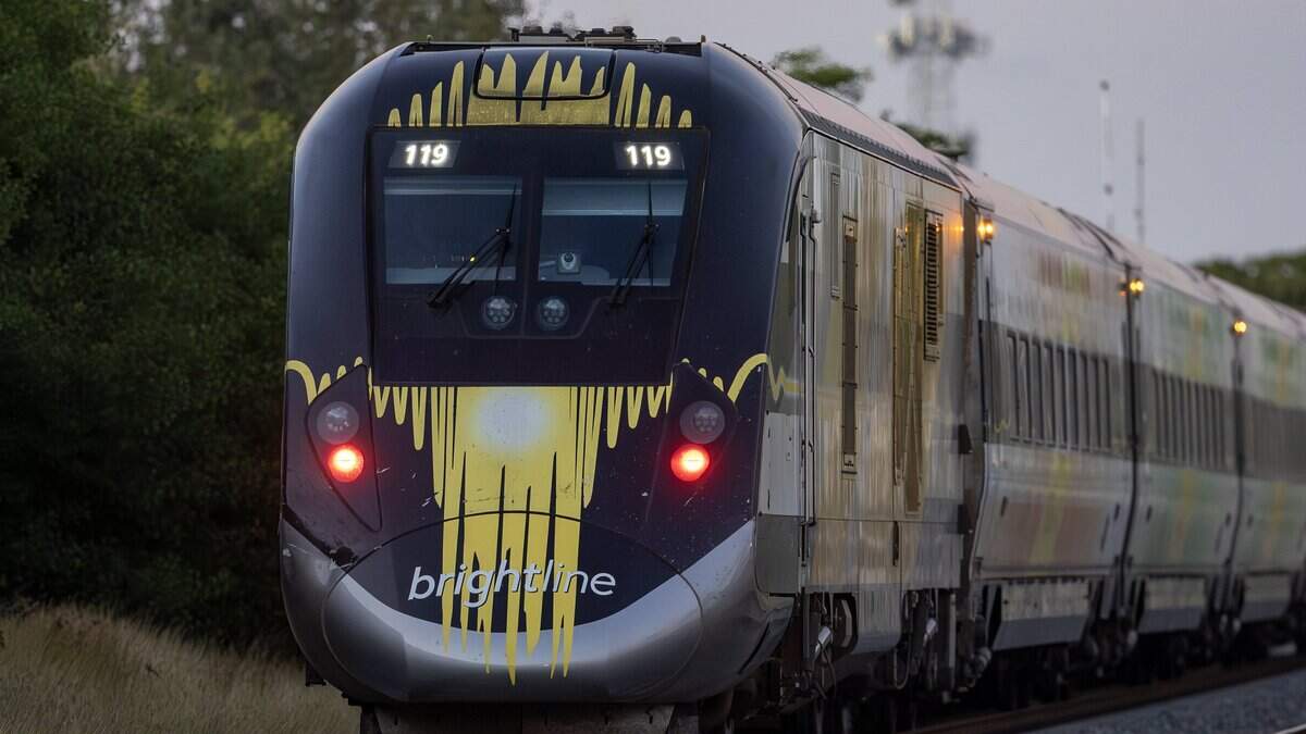 A Brightline train rests on the northbound track after colliding with a vehicle near the 14100 block of Biscayne Boulevard in Miami on Wednesday, Nov. 19, 2025. One person was airlifted to a trauma center.