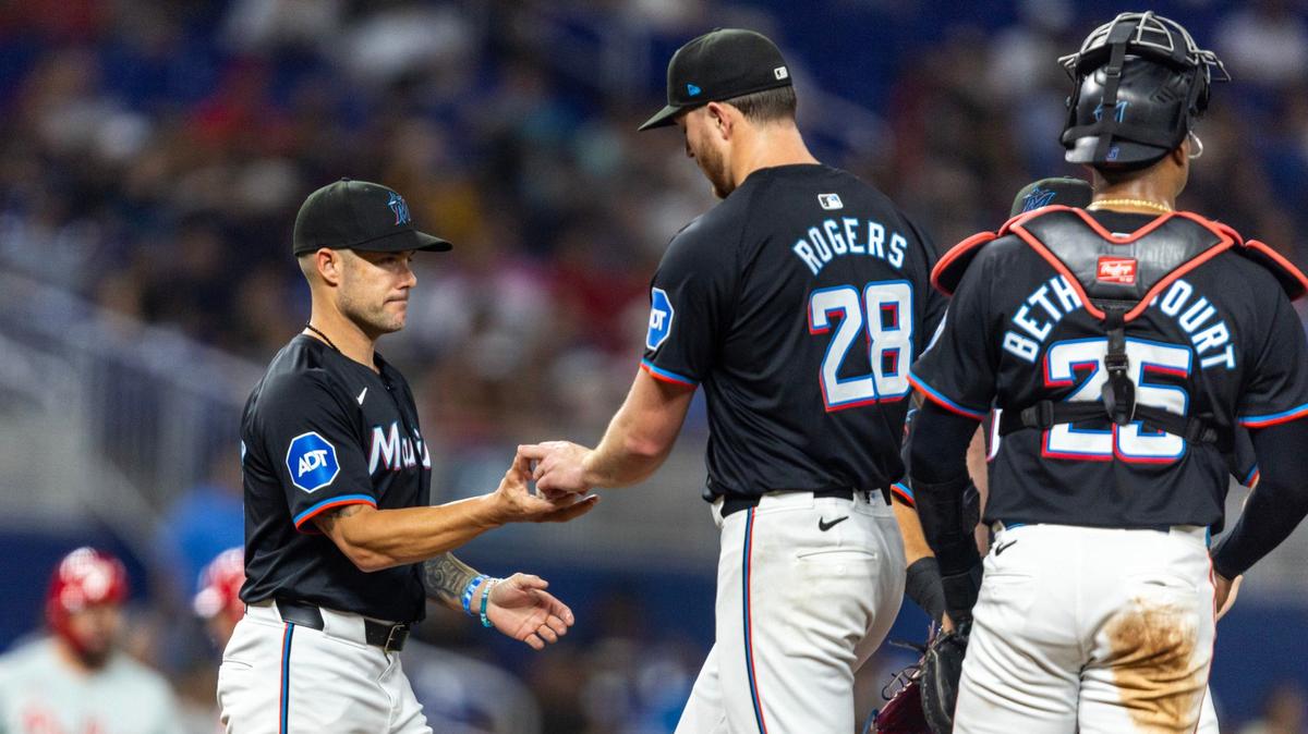 Miami Marlins manager Skip Schumaker pulls Miami Marlins pitcher Trevor Rogers (28) out of the game during the fourth inning of an MLB game at LoanDepot Park on Friday, May 10, 2024, in Miami, Fla.