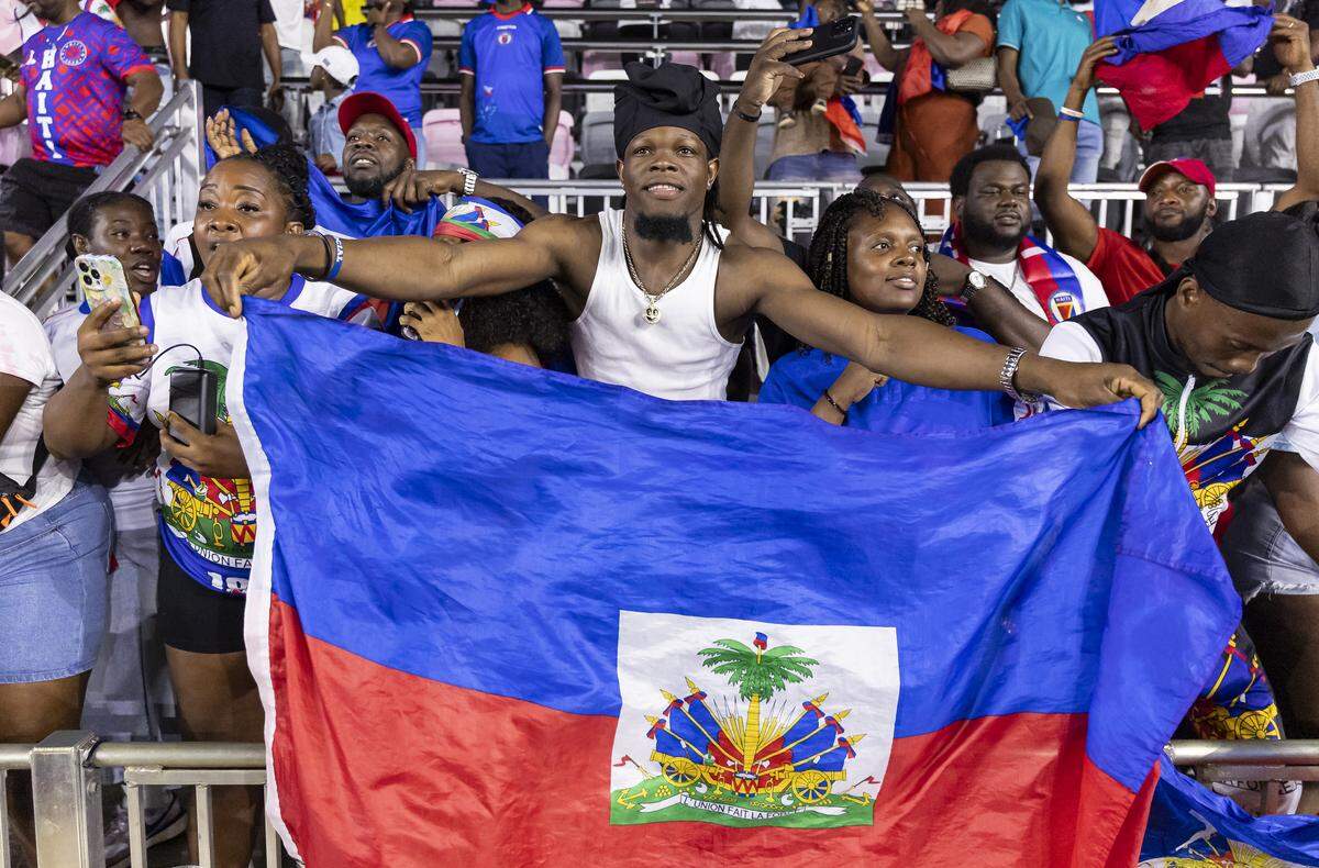 Haiti fans celebrate after defeating New Zealand in their friendly soccer match at Inter Miami Stadium on Tuesday, June 2, 2026, in Fort Lauderdale, Fla.