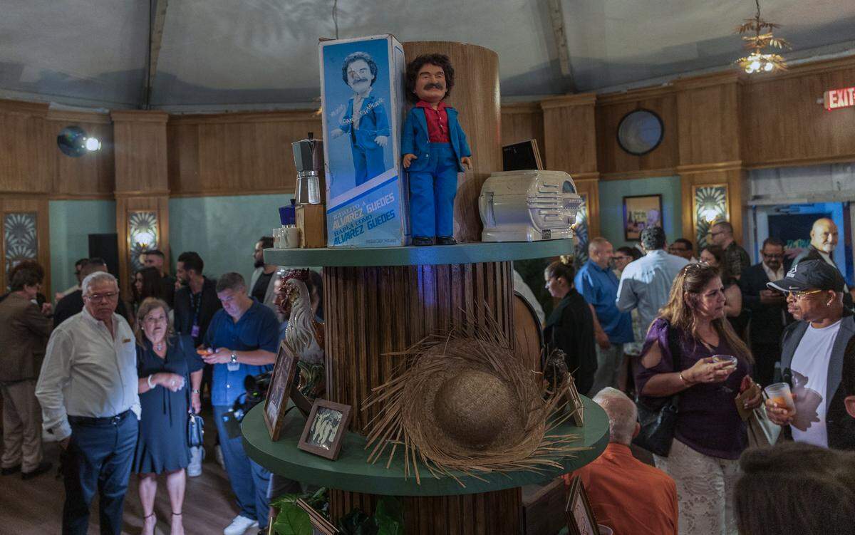 A vintage Alvarez Guedes talking doll on display at the bar of “Muerto de Risa – El Último Show de Álvarez Guedes.” Guests enter a waiting room before they go into the cabaret, where performers from the cast interact with guests while they sip cocktails. 