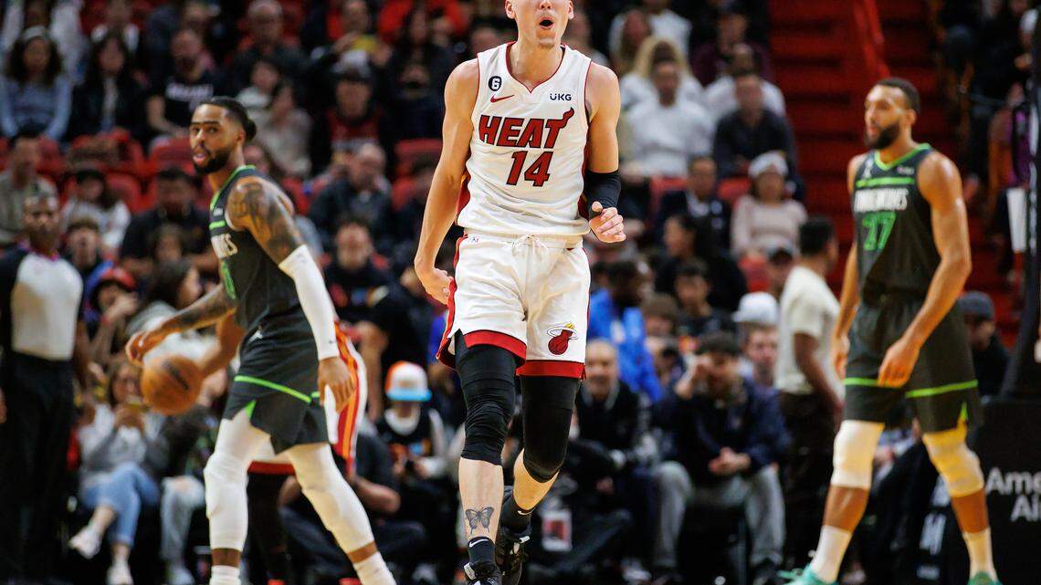 Miami Heat guard Tyler Herro (14) reacts after called for a personal foul during the first quarter of an NBA game against the Minnesota Timberwolves at FTX Arena in Miami, Florida, on Monday, December 26, 2022.