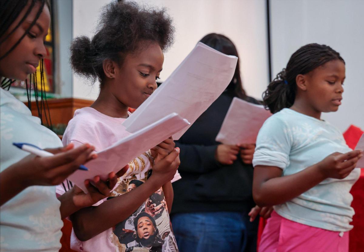 Kids at Macedonia Missionary Baptist Church practice their lines during rehearsal for the Christmas play. This church is the oldest Black church in South Florida and plans to expand to accommodate its growing programming for the neighborhood children.