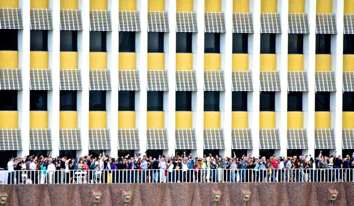 About 1,000 current and former Herald employees join together during the Miami Herald reunion party for a toast to the future at the 1 Herald Plaza balcony overlooking the Miami Bay on Wednesday, March 20, 2013.