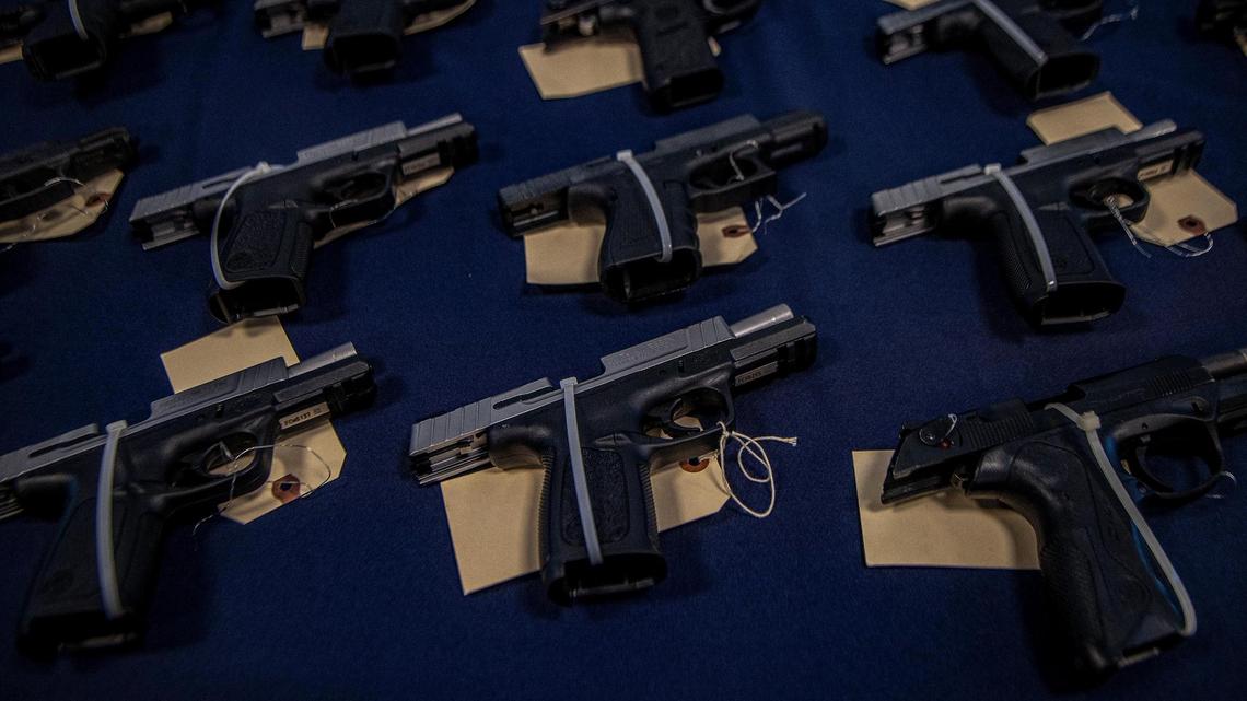 View of several Haiti-bound semiautomatic weapons seized in Miami by Homeland Security Investigations. The agency on Wednesday, Aug. 17, 2022, announced a crackdown on firearms and ammunition being smuggled to Haiti, which is seeing an increase in deadly gang violence and kidnappings.