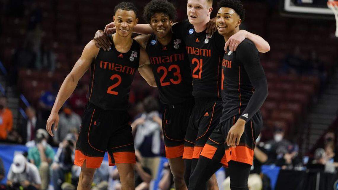 Uninversity of Miami players Isaiah Wong, Kam McGusty, Sam Waardenburg and Jordan Miller celebrate their 79-61 win over No. 2 Auburn that sent them to the Sweet 16. McGusty, Waardenburg are leaving, Miller is returning, Wong weighing options.