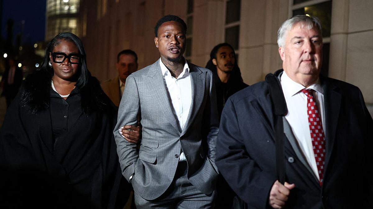 NBA player Terry Rozier (C) leaves with his lawyers after his arraignment hearing at Brooklyn Federal Court on charges tied to illegal sports betting and poker game schemes on December 8, 2025 in New York City.