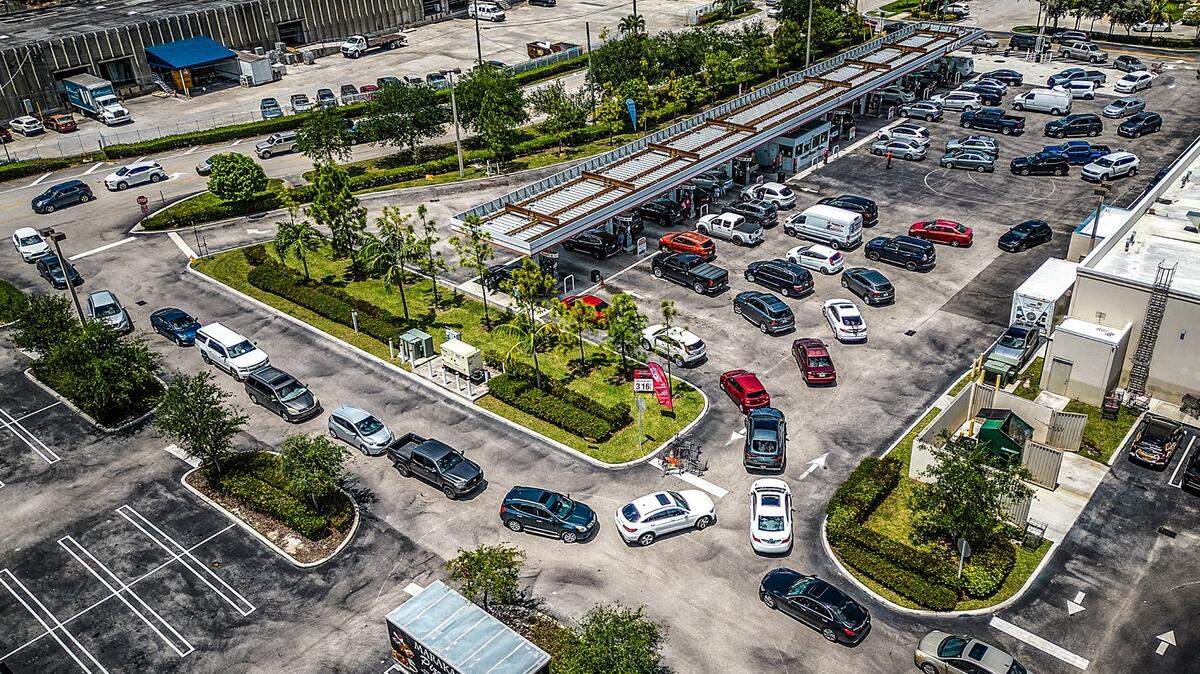 Long lines of car are seen at the BJ’s Wholesale Club gas station located at 7050 Coral Way in Miami, FL, due to a shortage of fuel resulting from the floods on April 12 that disrupted operations at Port Everglades, the Broward County facility that is the hub for about 40% of the gasoline into Florida and serves 12 counties south of Lake Okeechobee, including Miami-Dade, Broward, the Keys and Palm Beach County. On Tuesday April 18, 2023.