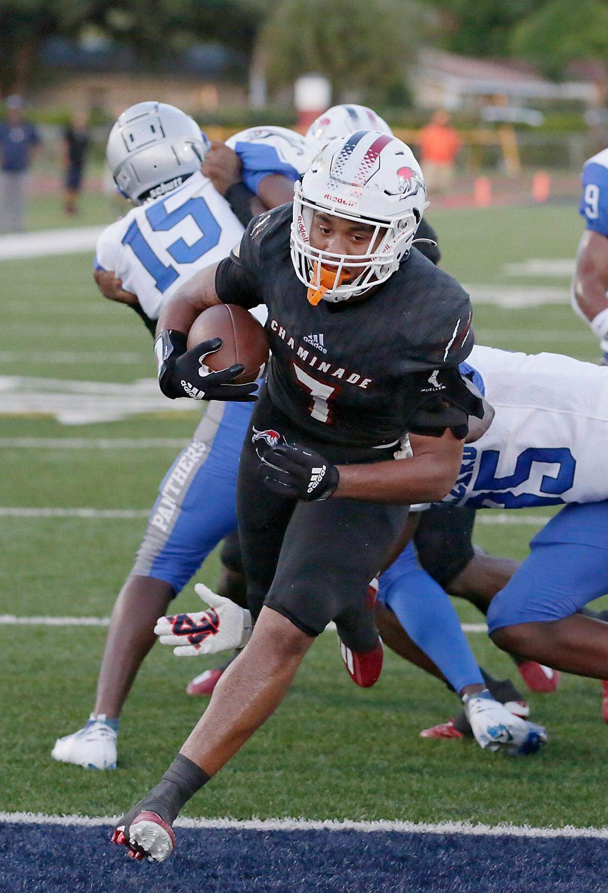 Chaminade-Madonna Lions running back Davion Gause (7) scores a touchdown against Dillard Panthers during football game on Friday, September 2, 2022 at Chaminade-Madonna HS in Hollywood. Andrew Uloza / for Miami Herald