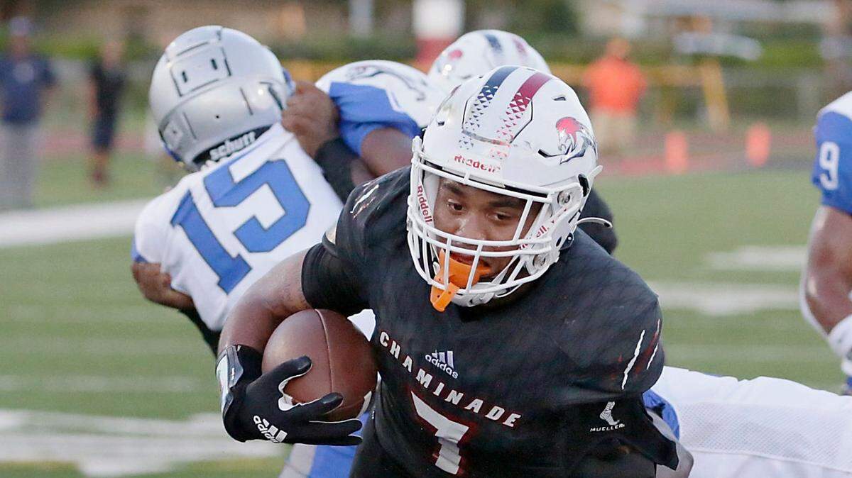 Chaminade-Madonna Lions running back Davion Gause (7) scores a touchdown against Dillard Panthers during football game on Friday, September 2, 2022 at Chaminade-Madonna HS in Hollywood. Andrew Uloza / for Miami Herald