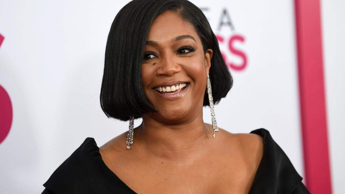 Recording Academy’s interim president apologized for the organization inviting Tiffany Haddish to host the Grammys ceremony without pay.