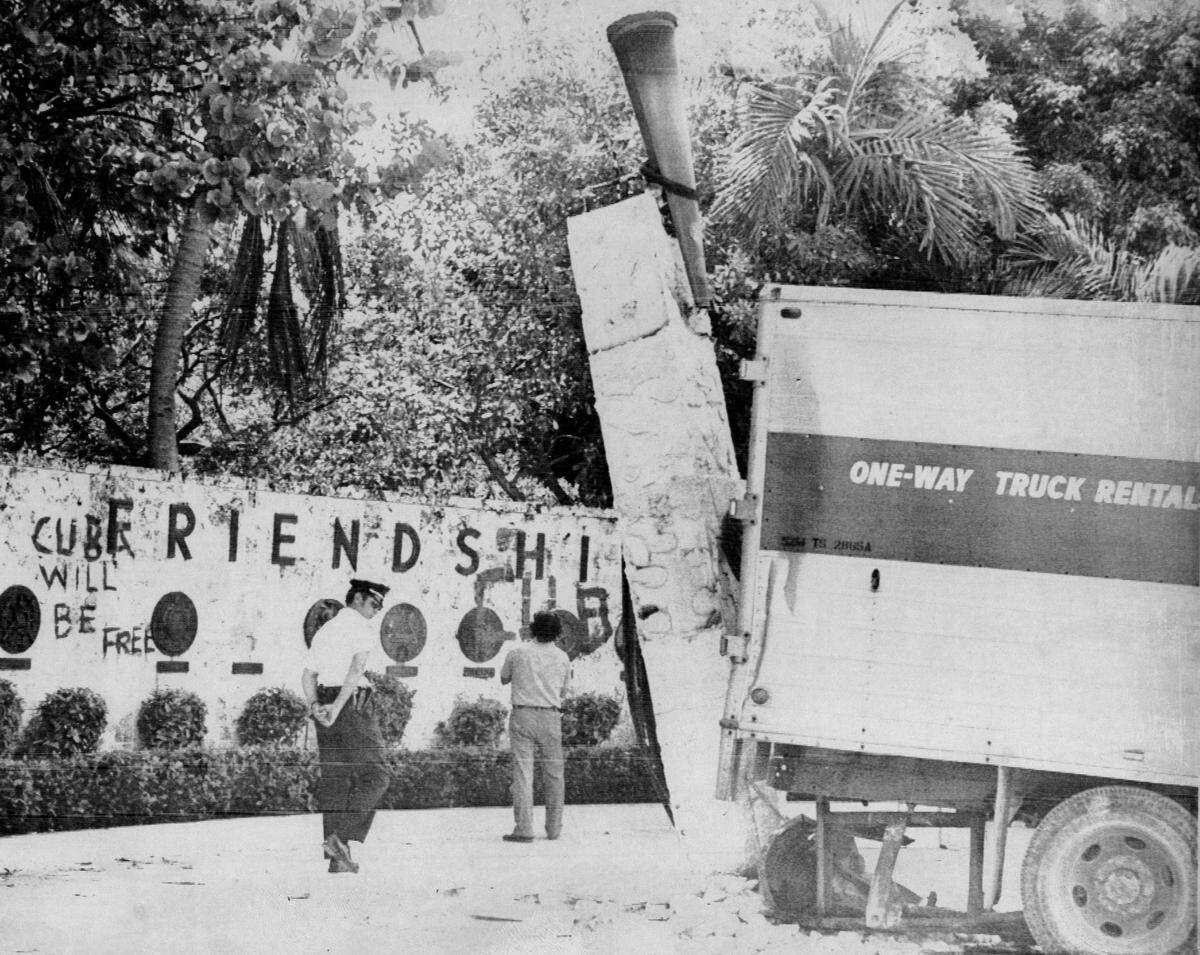 In a protest, people in 1974 backed their rented truck into the Torch of Friendship over the possible renewal of relations between the U.S. and Cuba.