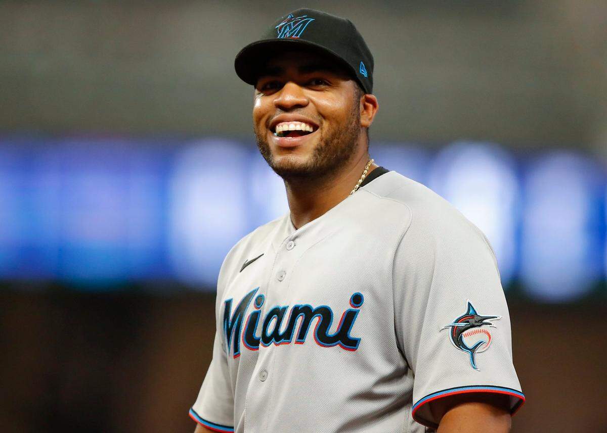 Jesus Aguilar #24 of the Miami Marlins reacts in the eighth inning of an MLB game against the Atlanta Braves at Truist Park on April 13, 2021 in Atlanta, Georgia.