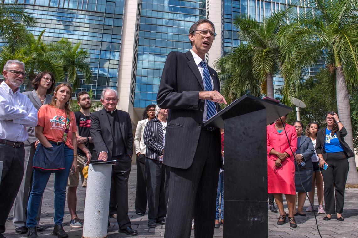 Philip Stoddard, mayor of the City of South Miami, speaks at a press conference outside the Wilkie D. Ferguson U.S. Courthouse in Miami on Thursday, Sept. 26, 2019, before a court hearing where South Miami and immigrant rights groups seek an injunction over what they call an unconstitutional immigration law. The new Florida law requires police officers to cooperate with federal immigration enforcement agencies and prohibits sanctuary policies. The City of South Miami and multiple civil rights groups asked U.S. District Judge Beth Bloom to issue a preliminary injunction that prohibits state and local officials from enforcing this law.