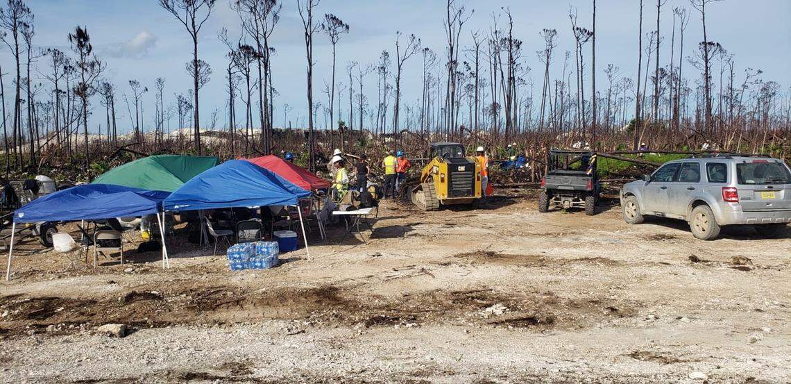 Employees of Norweigian oil company Equinor begin cleaning acres of protected Caribbean Pine on Grand Bahama Island that was coated with Equinor’s oil after Hurricane Dorian blew the roofs off the oil tanks.