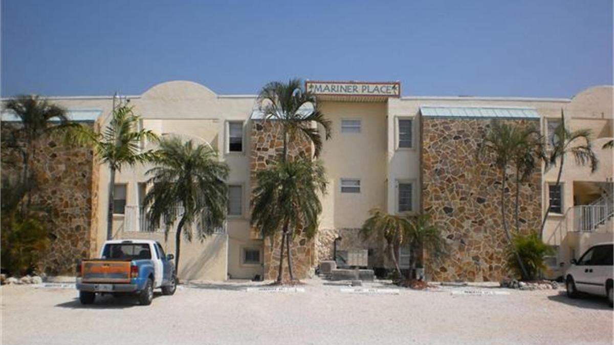 The Mariner Place apartment building in the Florida Keys was ordered vacated following a Feb. 15, 2022, inspector’s report that found major structural and electrical issues.